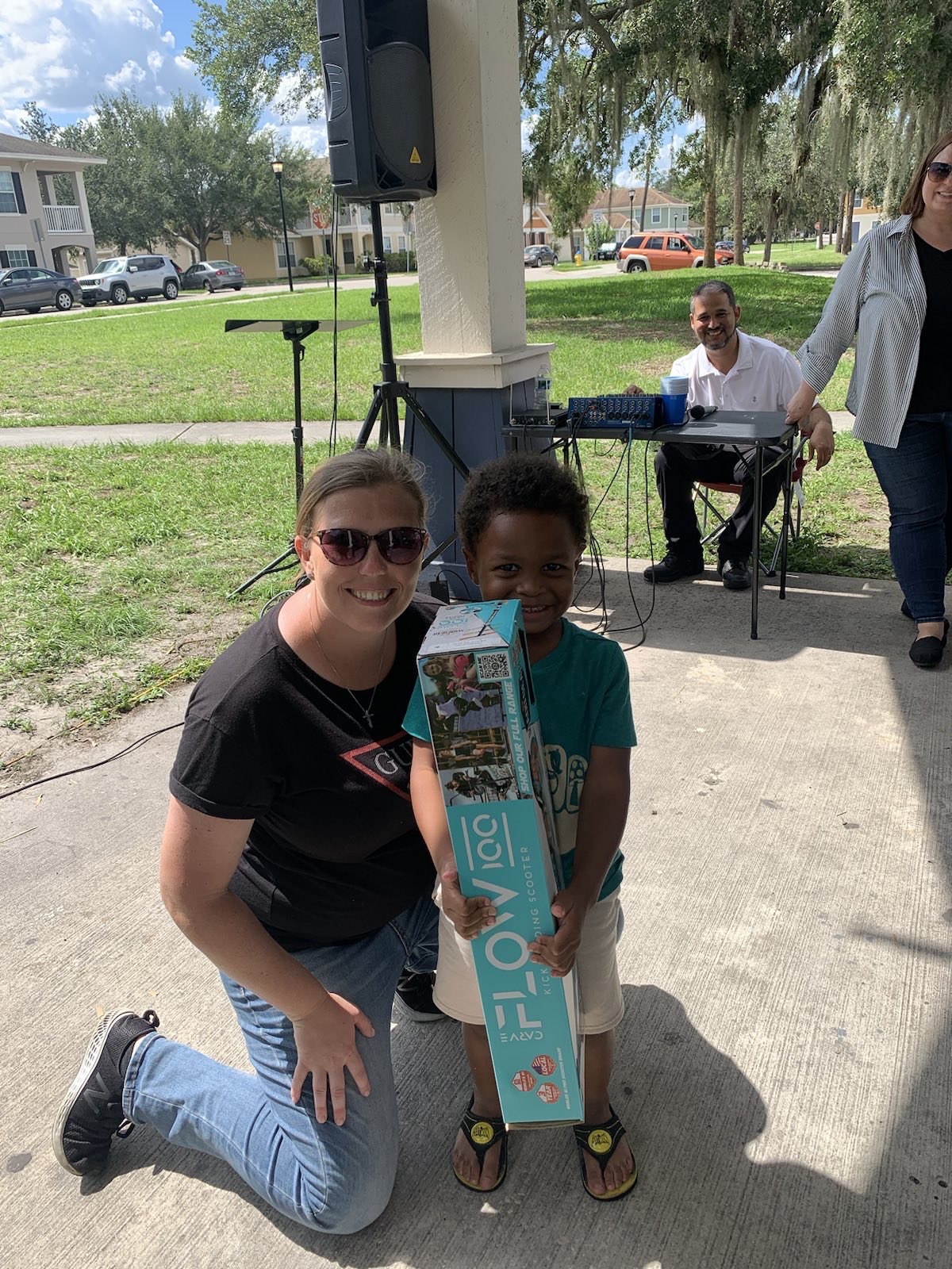 A new scooter for a neighborhood kid